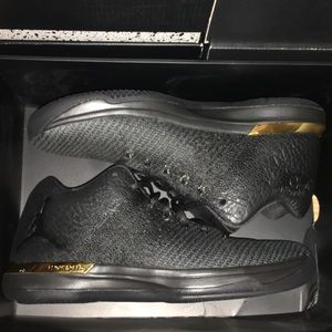 air jordan 31 low black gold